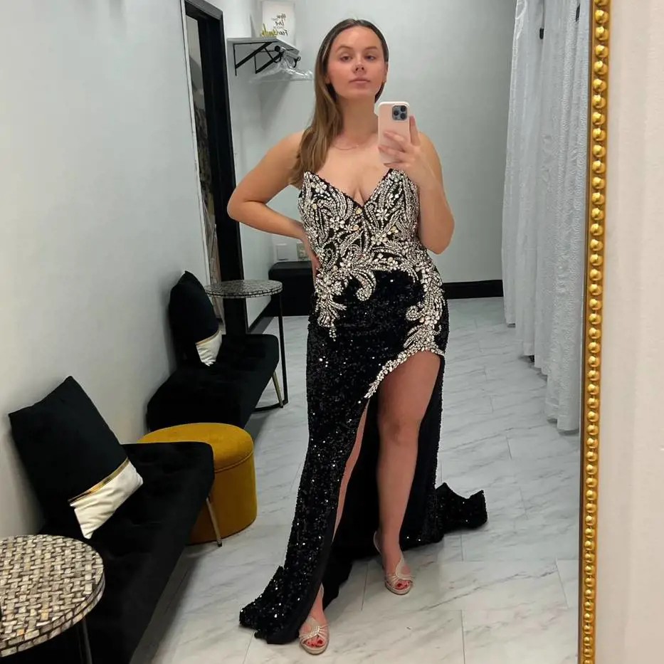 Model wearing a gown by Katelyn