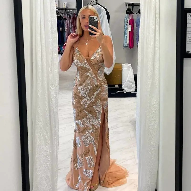 Model wearing a gown by Reghan